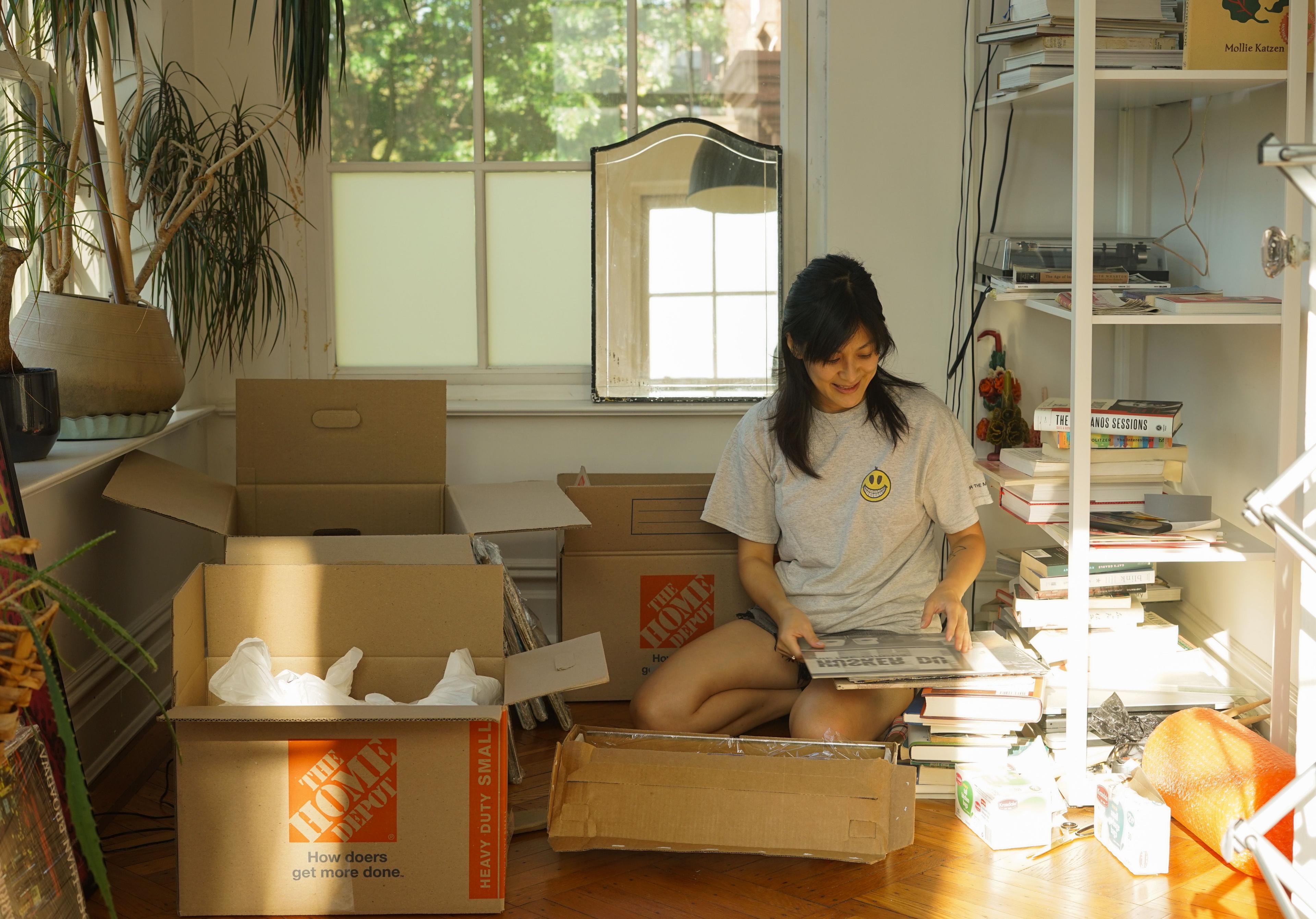 Diane packing her belongings