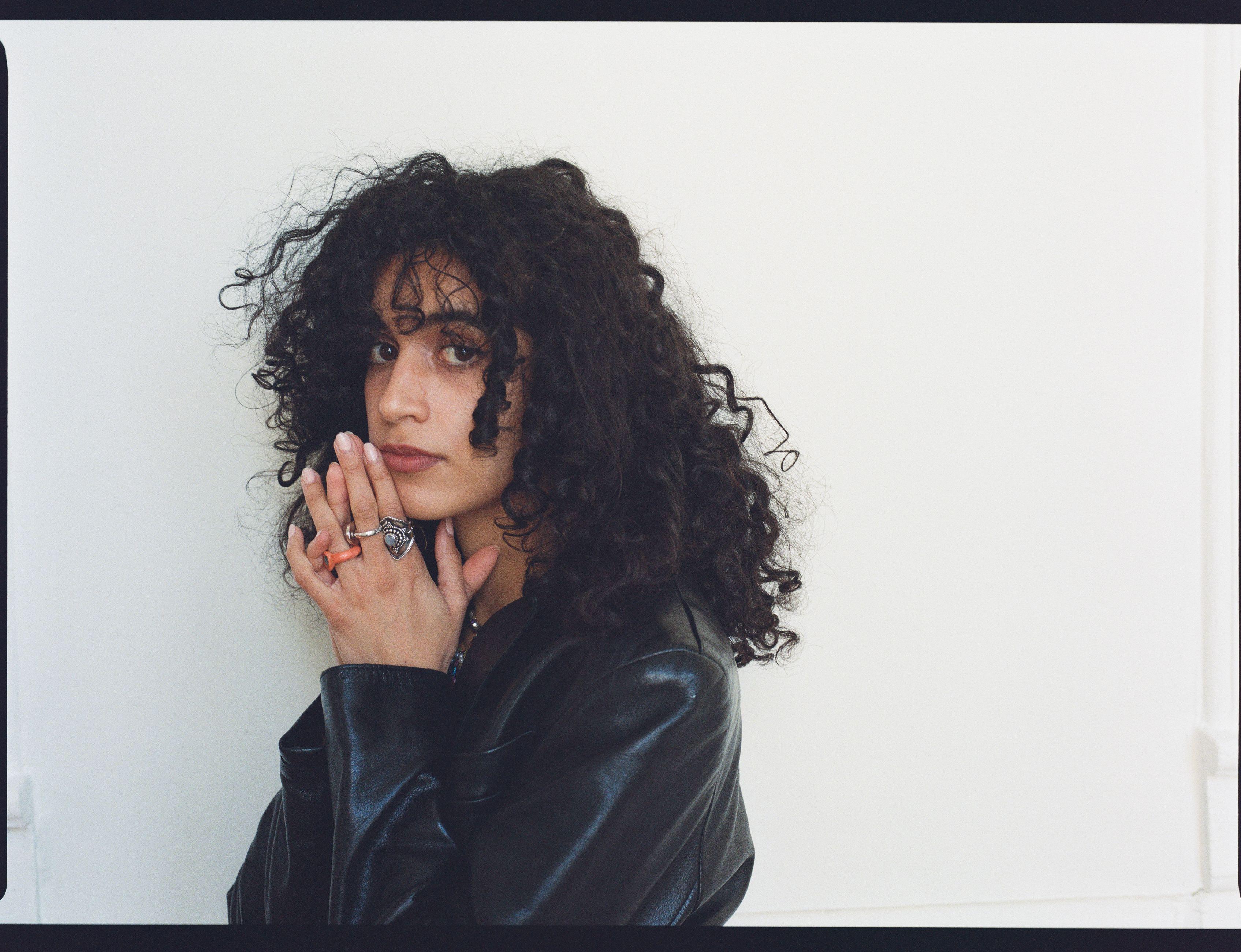 A portrait of artist Mashael Alsaie