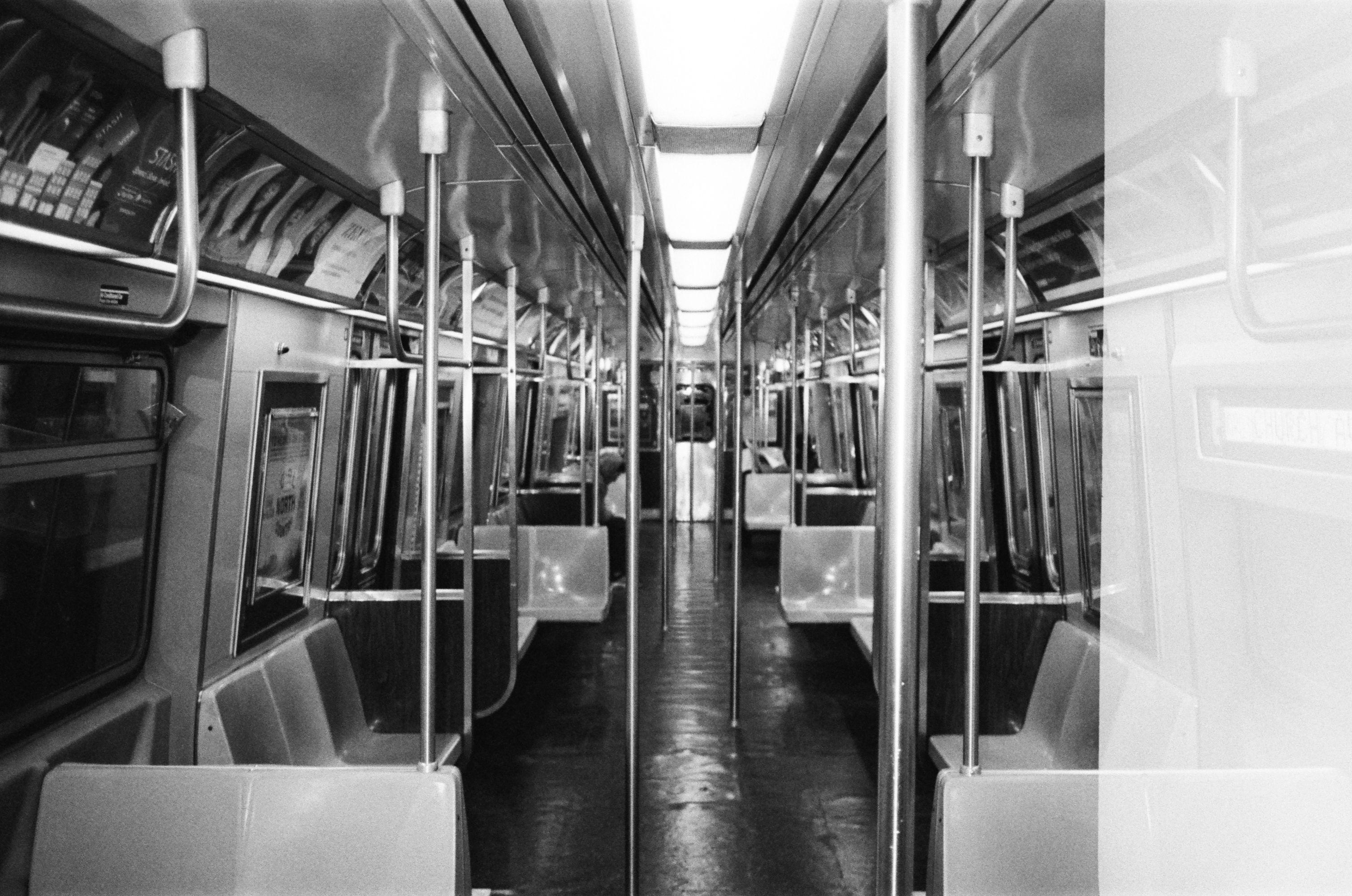 A blurry shot of an empty NY subway car